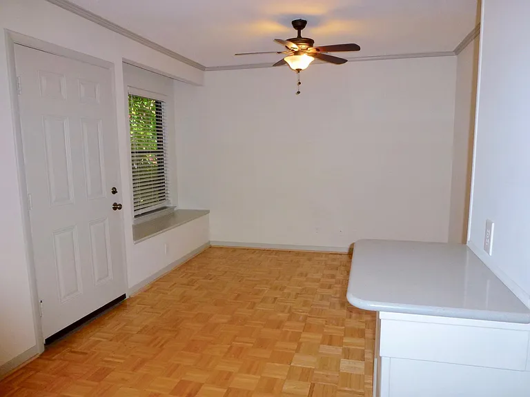 Ceiling fan, quartz countertop.