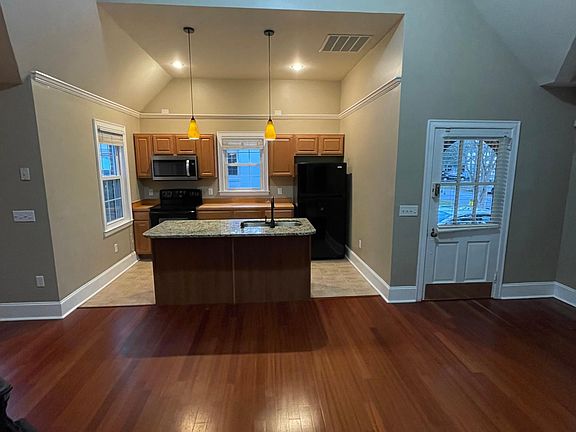View of the kitchen and front entry