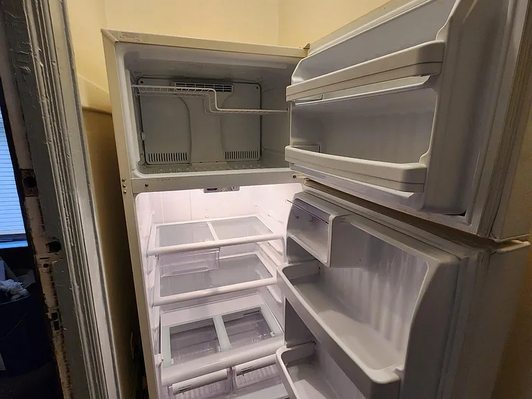 Kitchen back hall refrigerator open