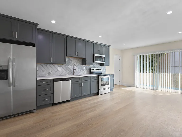 Open-Concept Kitchen, Dining, and Living Room Space