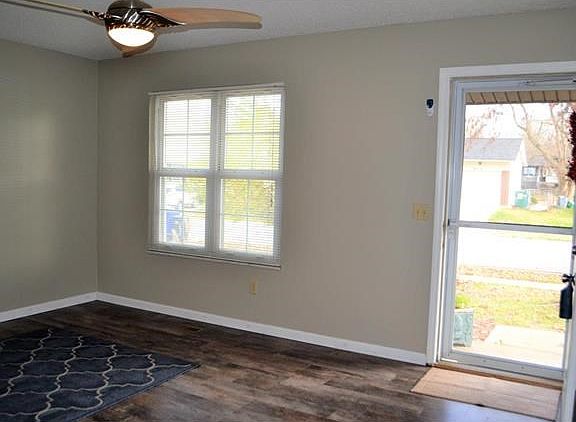 Light and bright living room at front of home.