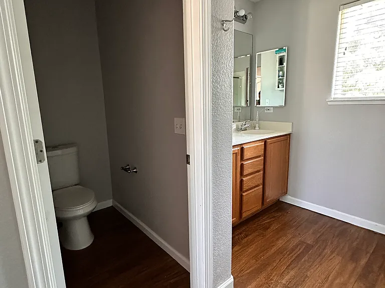 Large bathroom connected to large bedroom