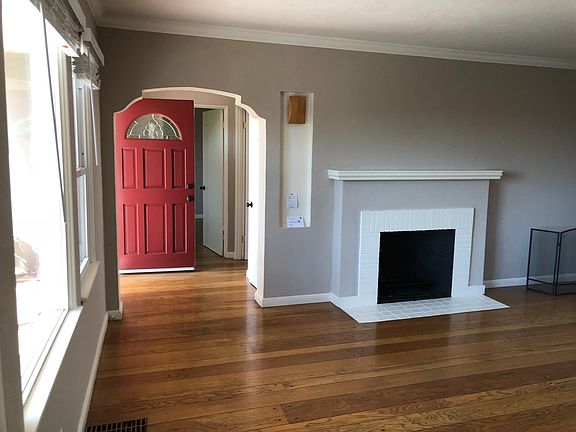 living room with wood fire place