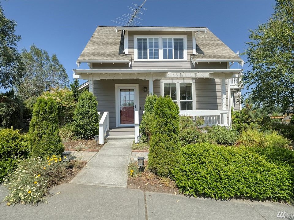 Welcome home to this well designed Ross Chapin home.  Enjoy the south facing porch all day.