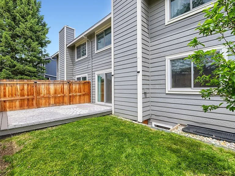 Private, fenced grassy yard