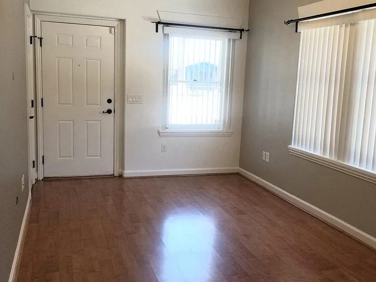 Front Entry and Dining Area, Features now includes a ceiling fan and faux wood blinds.