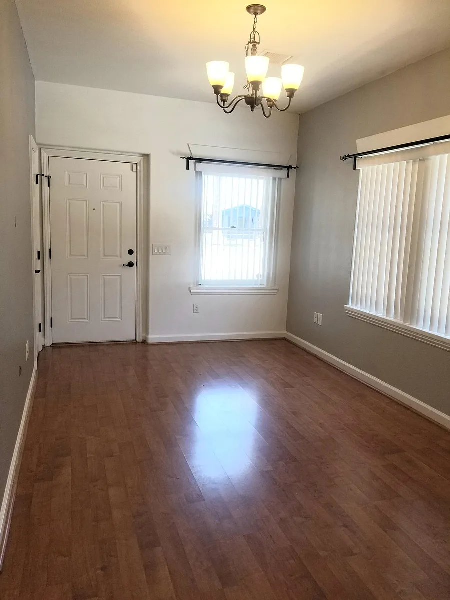 Front Entry and Dining Area, Features now includes a ceiling fan and faux wood blinds. - 1517 E Garfield St