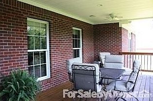Back porch
						:
						Covered deck - overlooking beautiful lot.