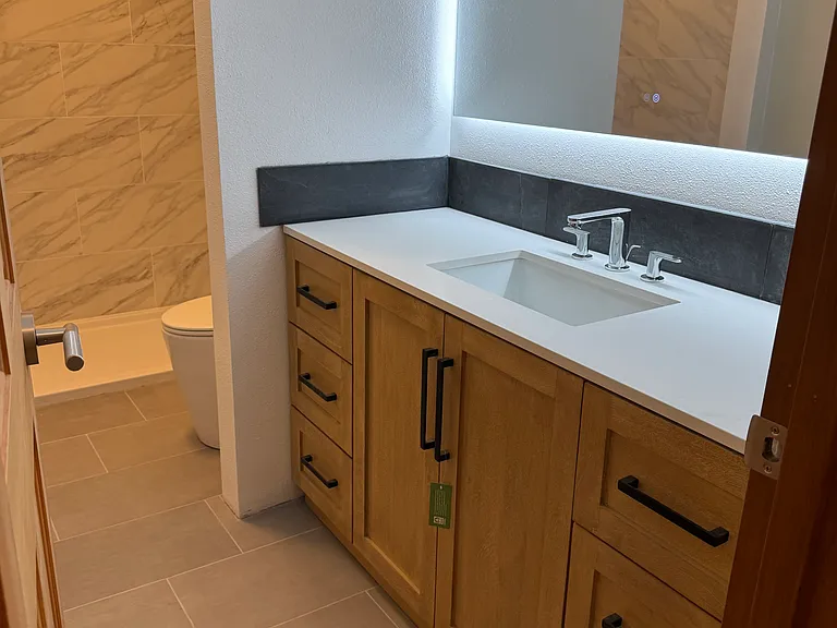 Upstairs guest bath, heated tile floors, new vanity and shower