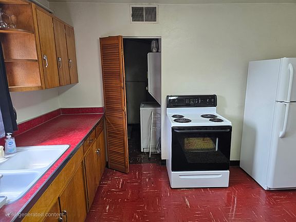 Laundry Room with Washer/Dryer off the Kitchen,