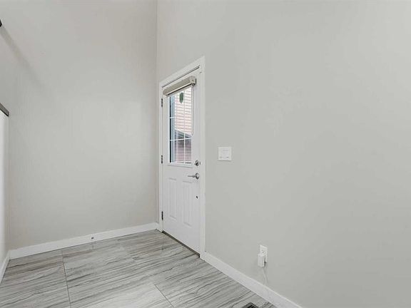 3rd image of 93 E Saddlestone Pl NE