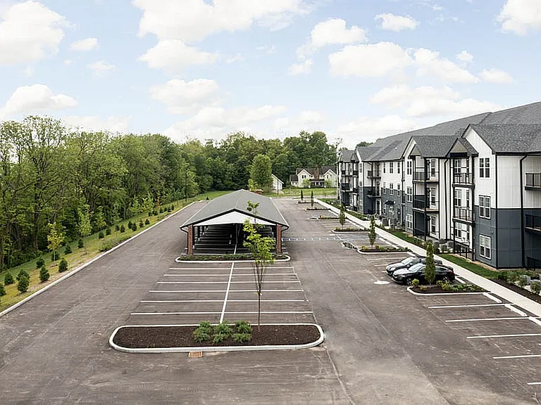Apartment Exterior Featuring Parking