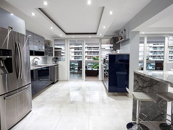 kitchen with balcony in back