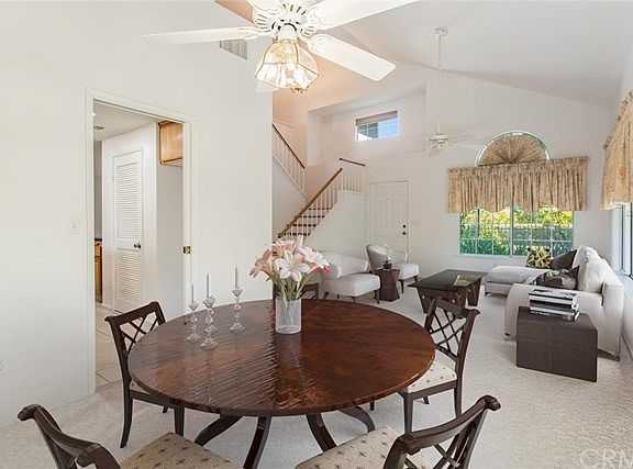 Virtually staged photo of living room & dining room