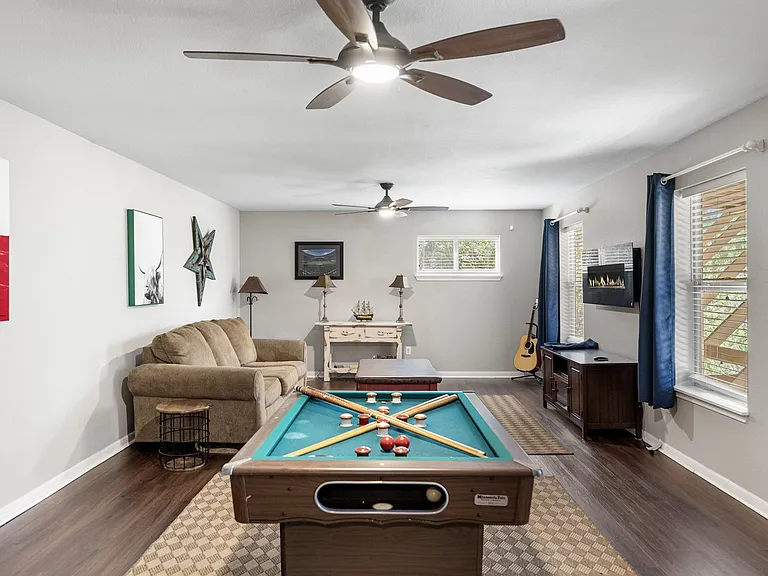 Basement / Game Room / queen sleeper sofa / fire place + more!