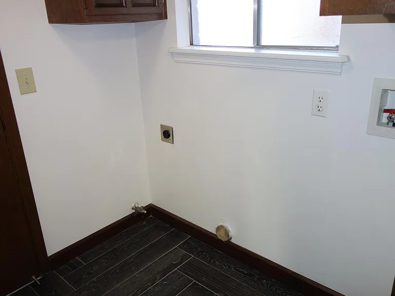 Laundry room with washer/dryer hookups! Gas or electric options for dryer!
