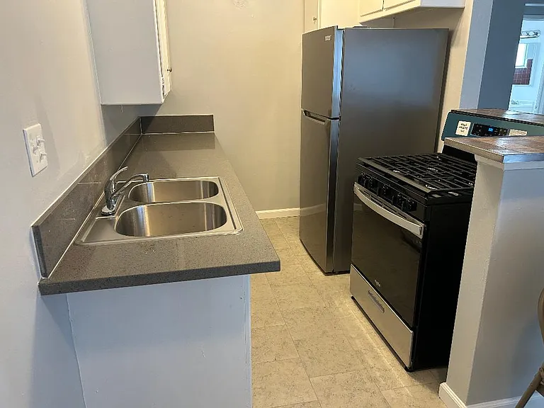 kitchen, Brand new Whirlpool 5 burners gas stove and brand new big Frigidaire refrigerator