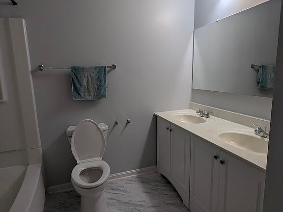 2nd Restroom featuring two hand sinks