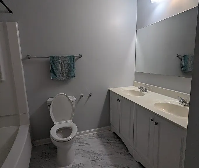 2nd Restroom featuring two hand sinks