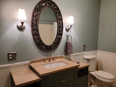Glamorous Bath with tile floors and handrails