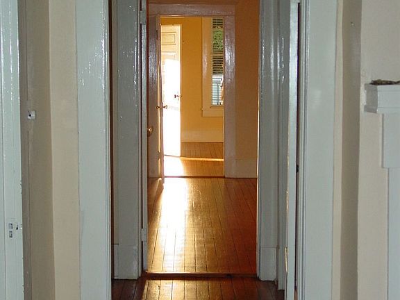 Hall and Bedrooms, straight view thru left side of home