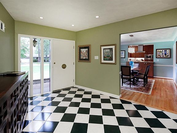 Front entry with view of dining room
