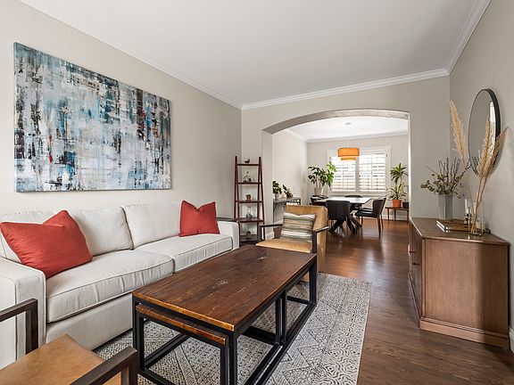 Living room and adjoining dining room off entry