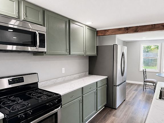 5th image of 107 E State St