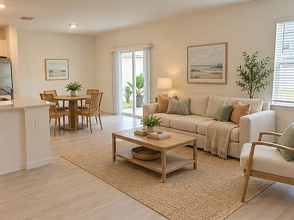 Open living room space to kitchen to allow conversations to flow easiy while someone is cooking in kitchen.