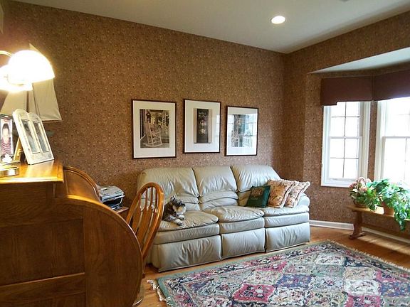 Library on main floor with French doors