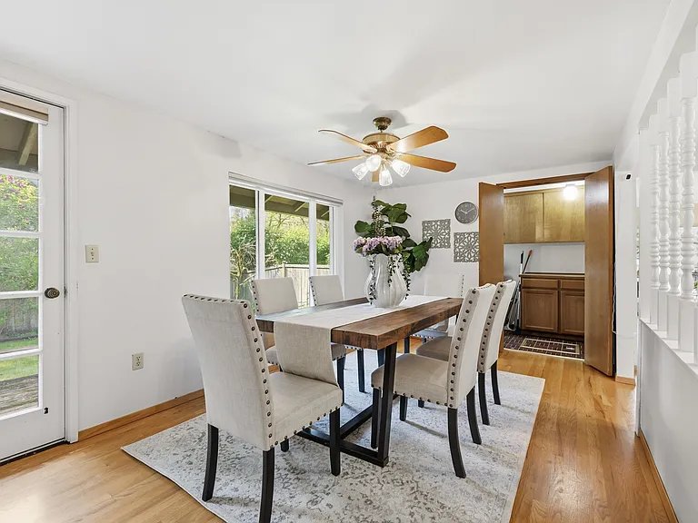 Dining area with backyard views and access to the deck
