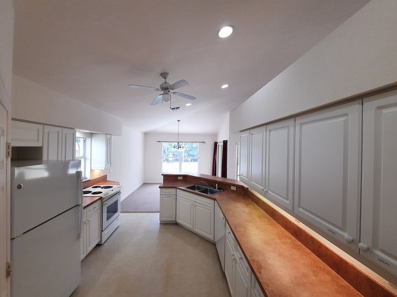 View of Kitchen toward Dining Area and Pool
