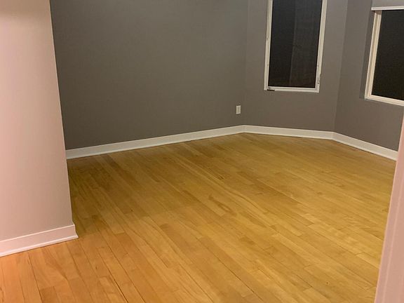 Main level master bedroom with his and her walk-in closets