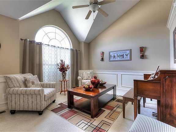 Living room with vaulted ceiling