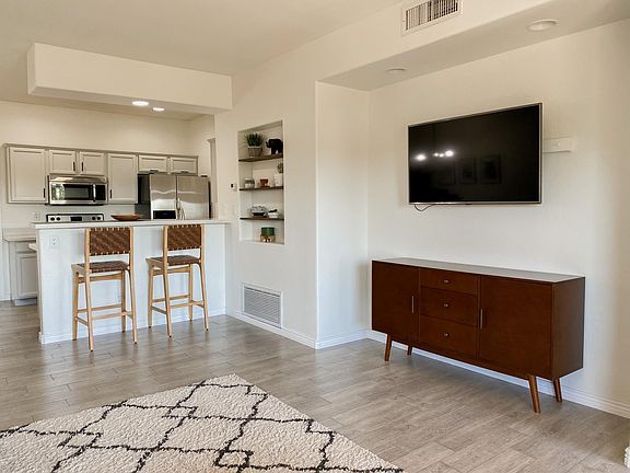 3rd image of 9100 E Raintree Dr Unit 244