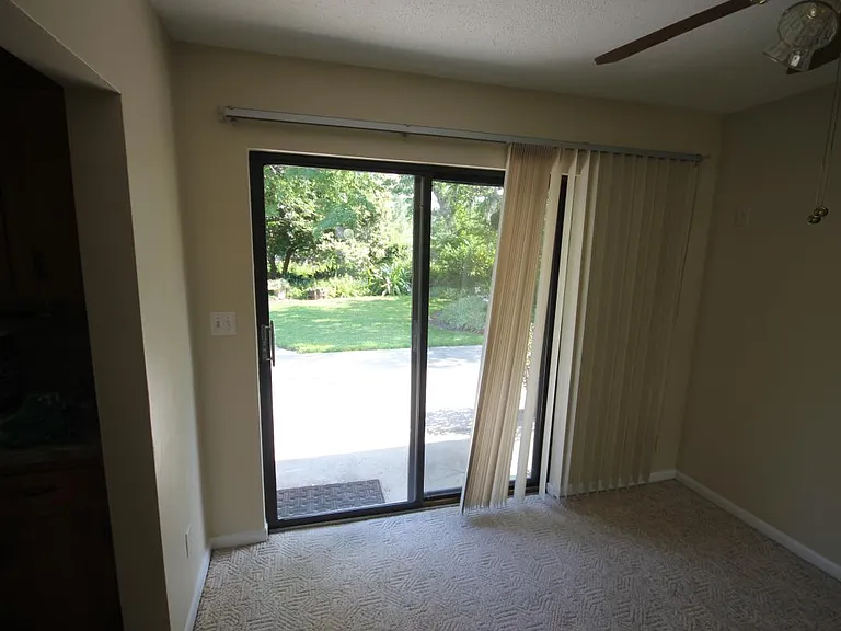 Dining / Patio door. This areas has LVT tile now. Same as the kitchen area.
