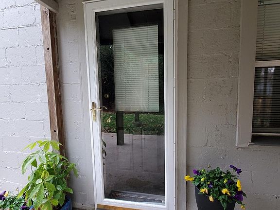 Entrance is off rear private patio. The storm door can be locked from the inside. The security lights are motion detecting. We also have motion detecting lights in the front of the house and on the side to provide a well lit path.