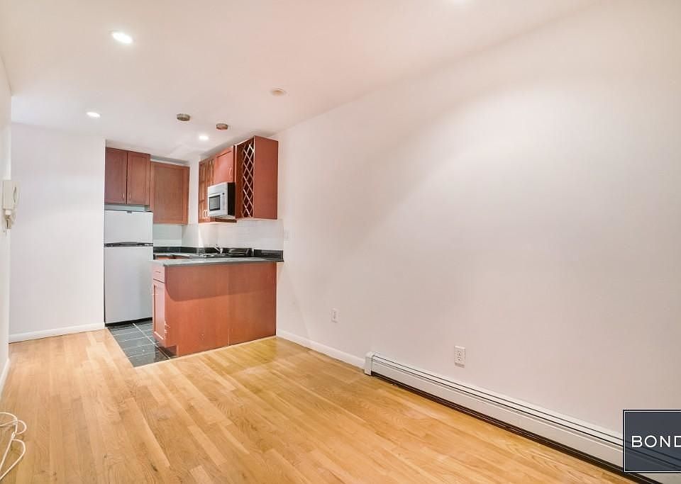 1st image of 340 E 9th St APT 10A