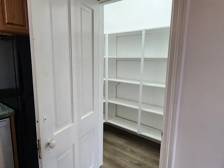 Pantry with custom shelves.
