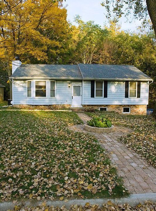 Charming ranch home on private lot.  Mature trees. Cobblestone walkway.