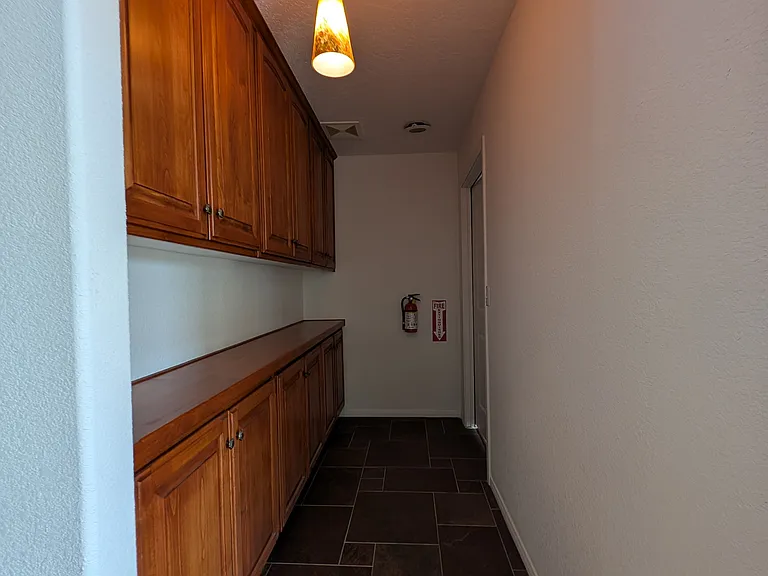 Hallway storage leading to master