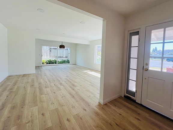 Entry foyer looking in to formal living and dining rooms.