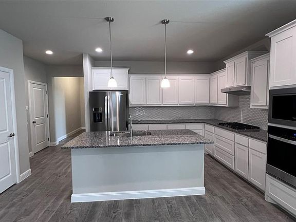 Kitchen-All Home and community information, including pricing, included features, terms, availability and amenities, are subject to change at any time without notice or obligation. All Drawings, pictures, photographs, video, square footages, floor plans, elevations, features, colors and sizes are approximate for illustration purposes only and will vary from the homes as built.
