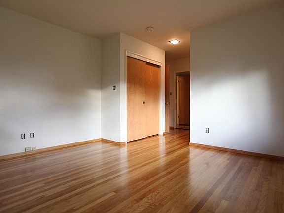 Hardwood flooring in all bedrooms