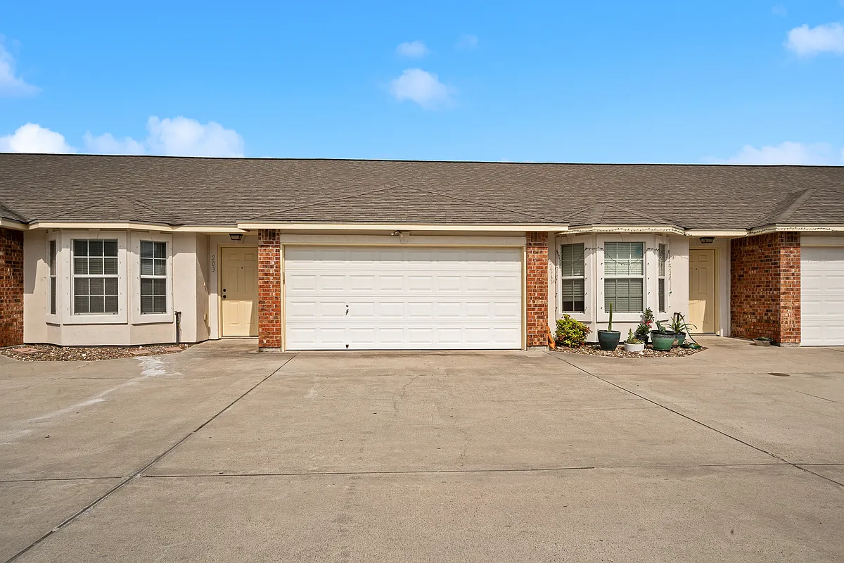 Photo 2 of 10 - 13669 Teague Ln #1 - Corpus Christi, TX Exterior view, 2-car garage - 13669 Teague Ln #1