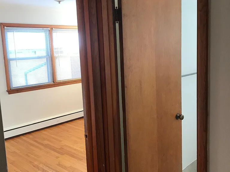 View of bathroom entry and bedroom 2