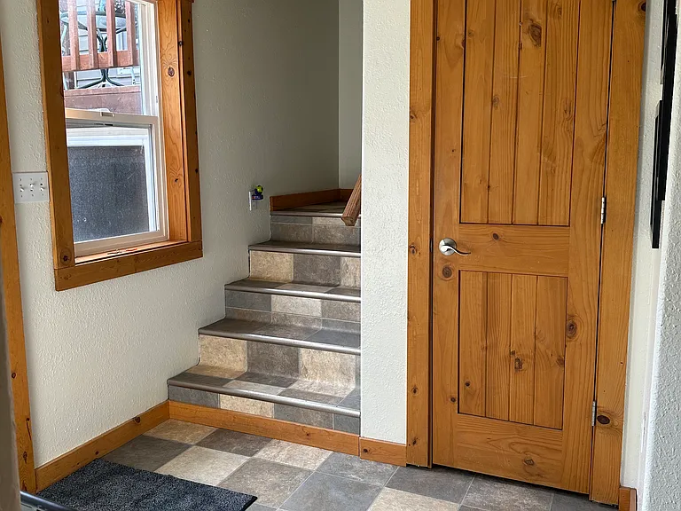 Entryway and stairway to the master bedroom