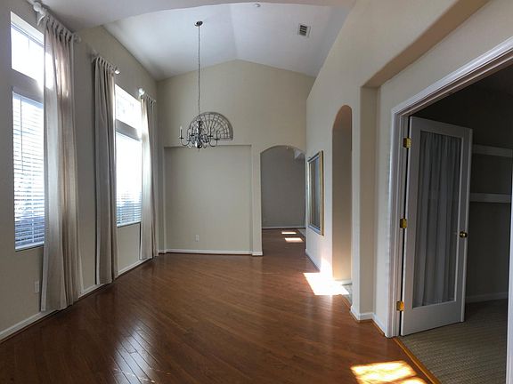 Living room, dining room, office/den.
