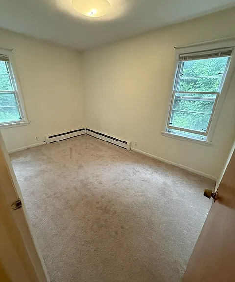 first small bedroom with 2 windows and big closet