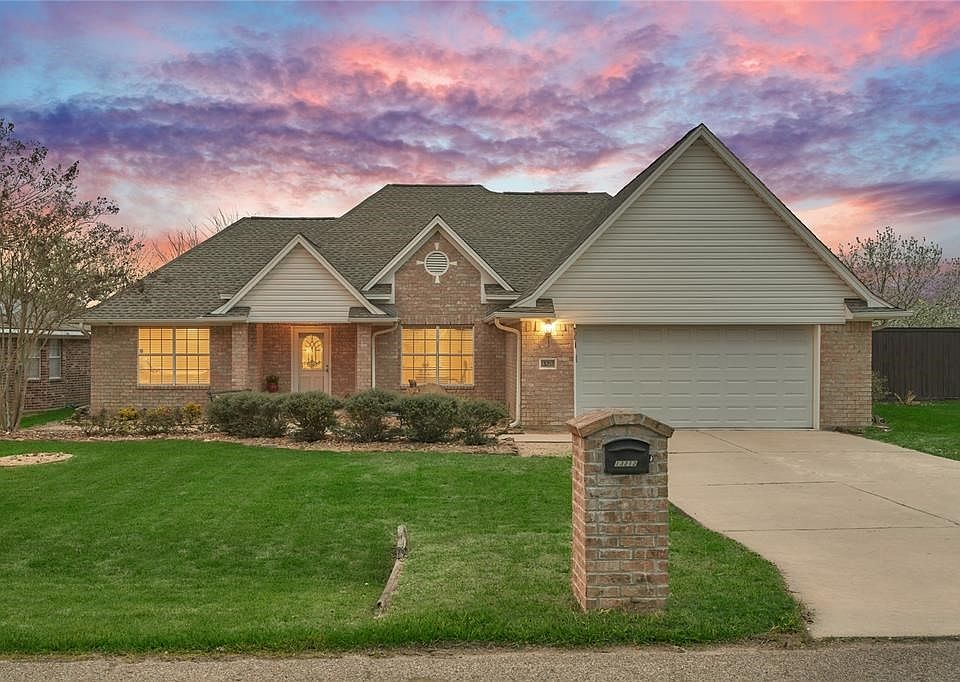 This magnificent home is situated on a luxurious canal of Lake Conroe!